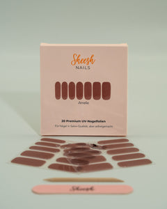 Sheesh UV-Nagelfolien „Amelie“ – Premium UV-Folien für Nägel in Salonqualität. Enthalten sind Nagelfolien, Feile und Holzstäbchen für eine einfache Anwendung und professionelle Maniküre zu Hause.