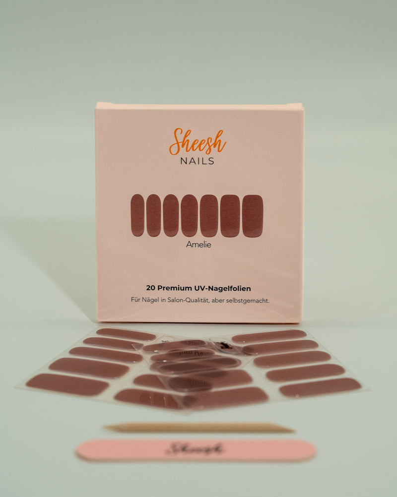 Sheesh UV-Nagelfolien „Amelie“ – Premium UV-Folien für Nägel in Salonqualität. Enthalten sind Nagelfolien, Feile und Holzstäbchen für eine einfache Anwendung und professionelle Maniküre zu Hause.