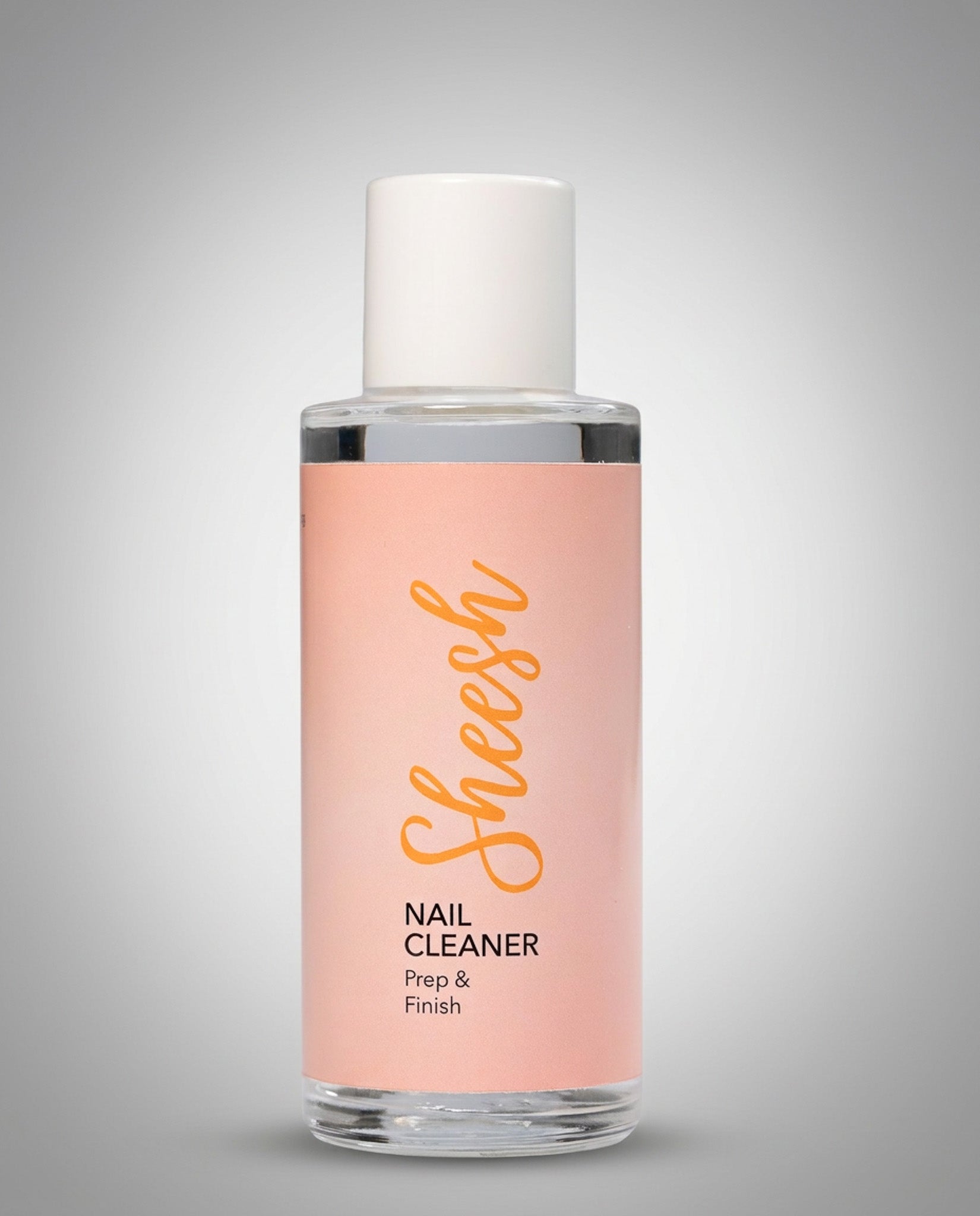 Sheesh Nails Nail Cleaner „Prep & Finish“ – klarer Nagelreiniger in transparenter 100-ml-Flasche mit weißem Deckel, Produktfoto auf grauen Hintergrund