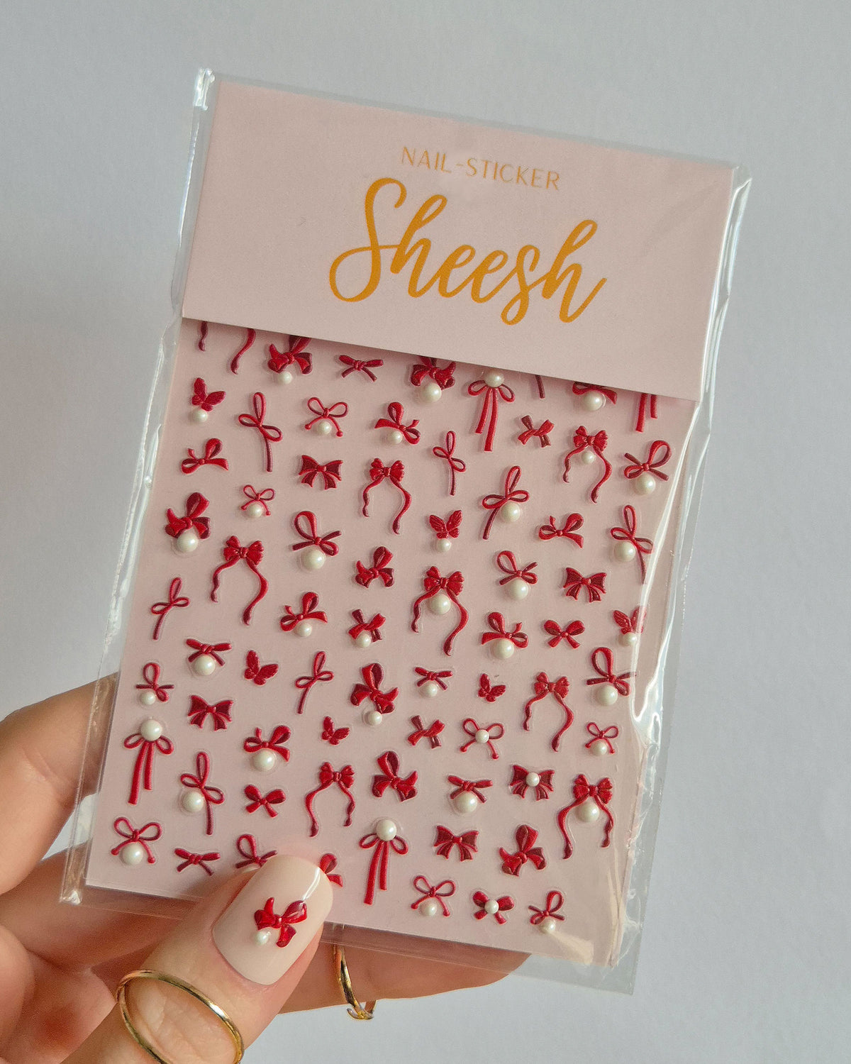 SHEESH Nails – Red Bow Schleifen | Nail Sticker, Bild 02: Kosmetiktasche mit Tigermuster – weiche rosa Stofftasche mit goldfarbenem Tiger-Design und Quaste….
